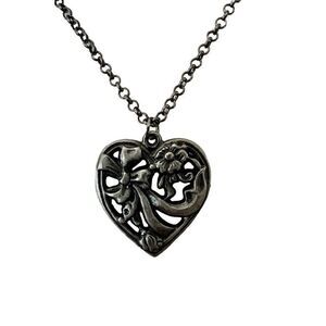 Silver tone heart pendant necklace